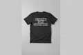 Black t-shirt with 'Detaching is my superpower' text on a gray background